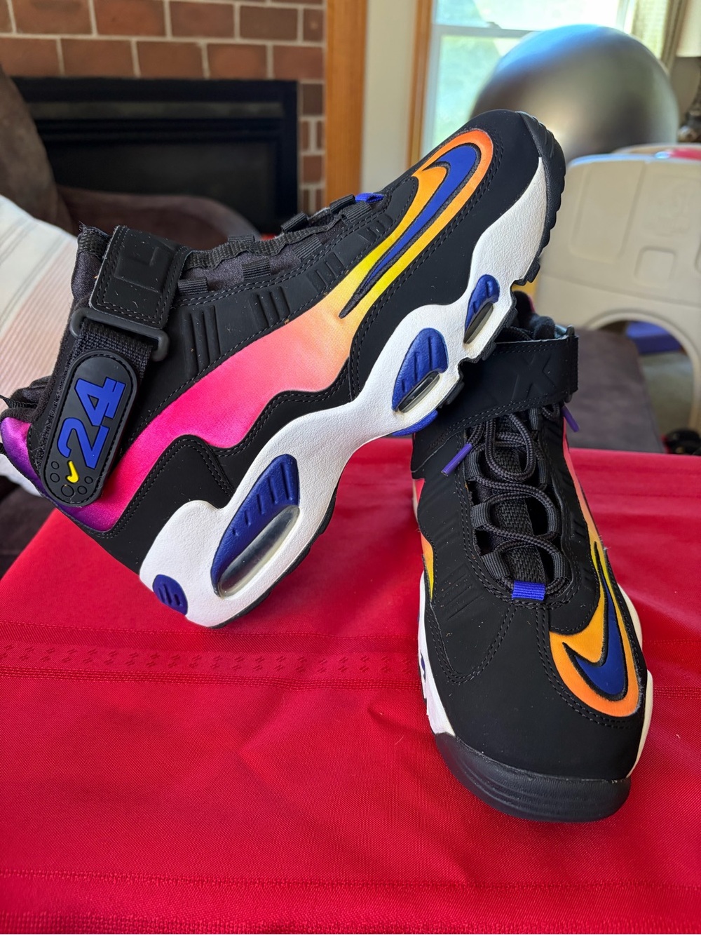 Nike women’s Black Sneakers with Orange, Pink & Purple Accents
